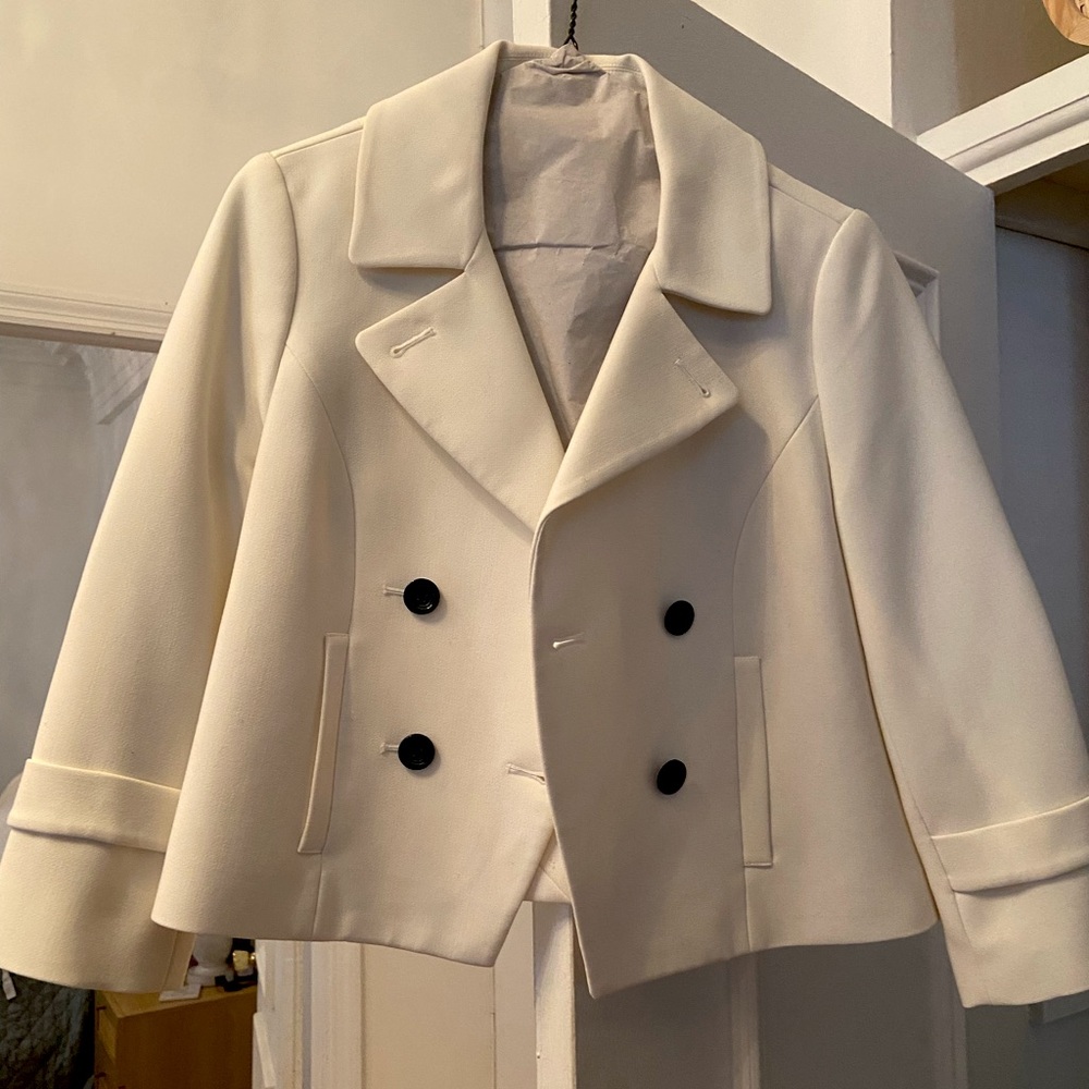 Chic White Blazer with Black Buttons